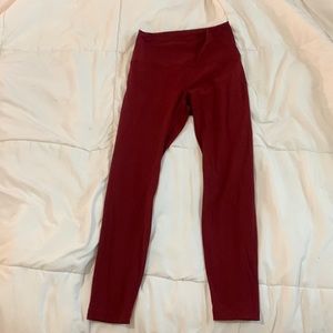 Red ish color leggings.